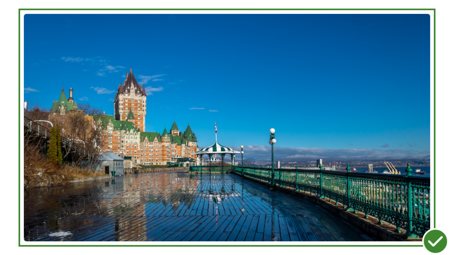 A wooden walkway extending towards a castle and blue sky in the background